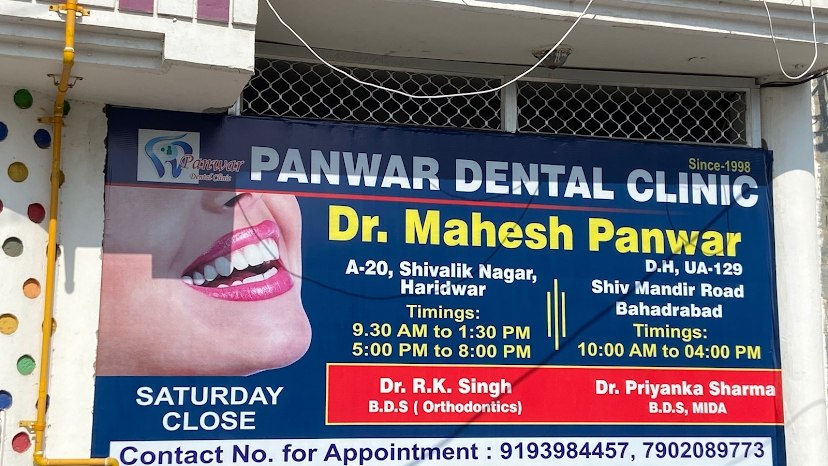 Panwar Dental Clinic exterior signboard for Shivalik Nagar and Bahadrabad timings