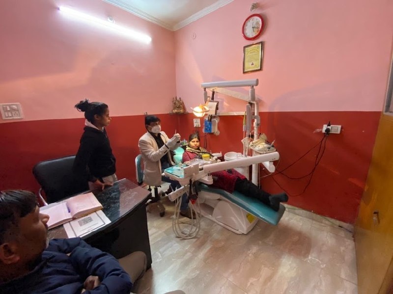 Dental treatment in red treatment room at Panwar Dental Clinic