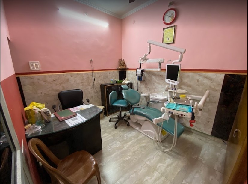 Overview of Panwar Dental Clinic treatment room with dental chair and desk